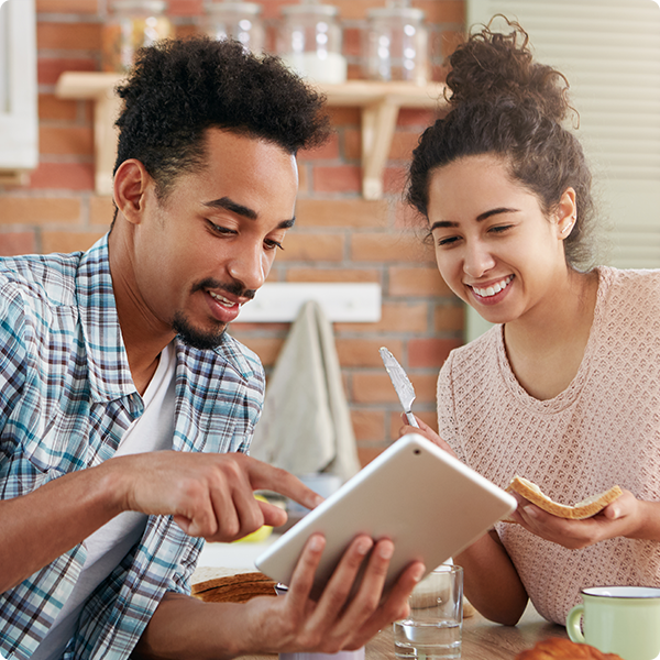Couple reviewing title insurance policies.
